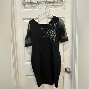 Black fitted dress with beads detailing and laced sleeves women’s size M